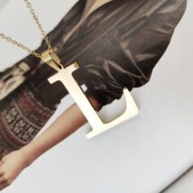 Naszyjnik stal chirurgiczna literka platerowana złotem NST100L