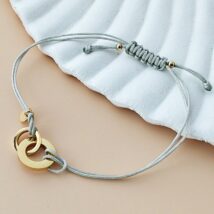 Bransoletka na rękę stal chirurgiczna pozłacana 14k złotem, szara na sznurku regulowana BST1555